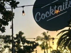 A Retro Vintage Cocktail Sign Hangs In The Village With Bistro Lights T20 8Dvykv - California Locals