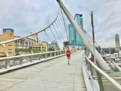 Woman Jogging Over A Cool Bridge In Downtown San Diego California - California Locals